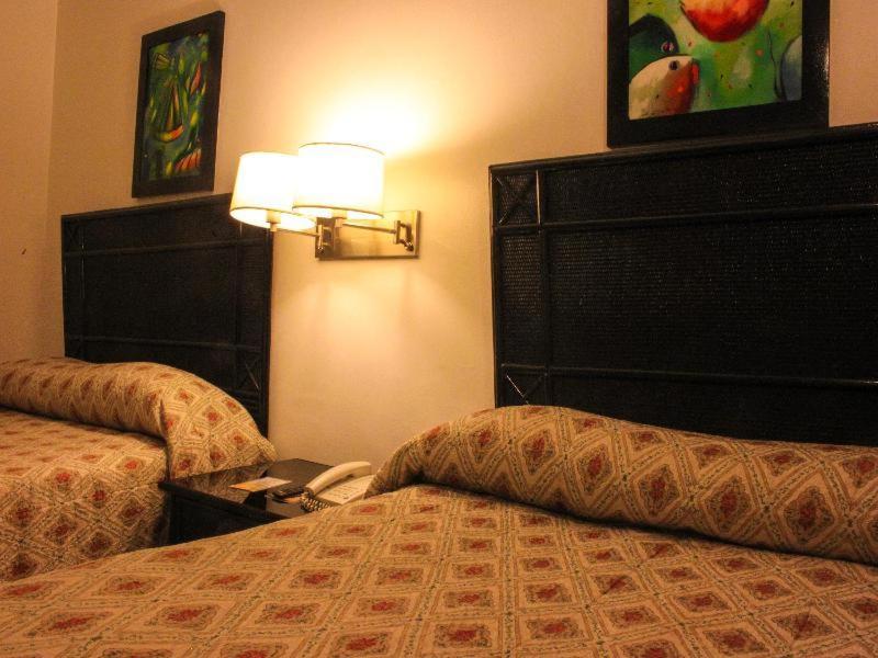 Napolitano Hotel Santo Domingo Quarto foto